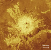 This image shows two tall volcanoes on Venus. Why is it yellow?