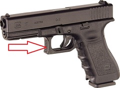 This part of the handgun (indicated by the red arrow) is called a: