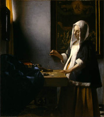 vermeer, woman holding a balance