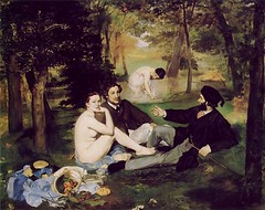 What aspects of Édouard Manet's Le Déjeuner sur
l'Herbe (Luncheon on the Grass) discomforted many viewers when it was first exhibited?