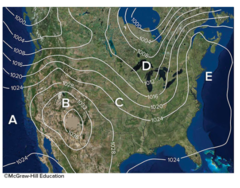 What location best represents a trough of low pressure?